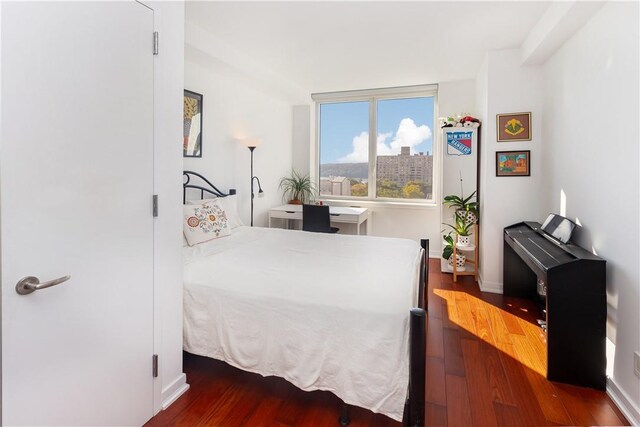 640 W 237th St Unit 12B, Bronx, NY 10463 - bedroom with dark hardwood / wood-style flooring