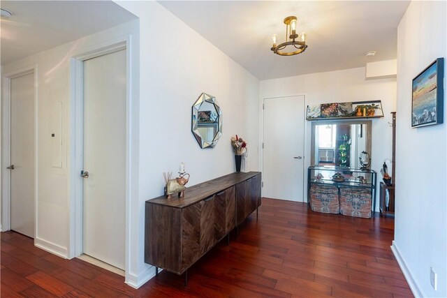 640 W 237th St Unit 12B, Bronx, NY 10463 - corridor with a notable chandelier and dark hardwood / wood-style floors