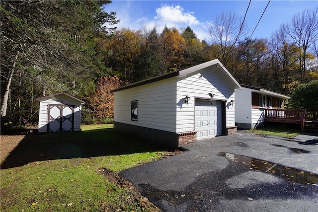 garage with a lawn