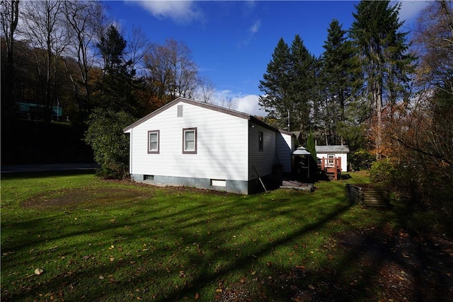 view of home's exterior featuring a yard