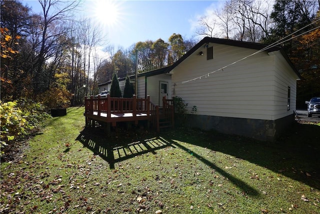 view of yard with a deck