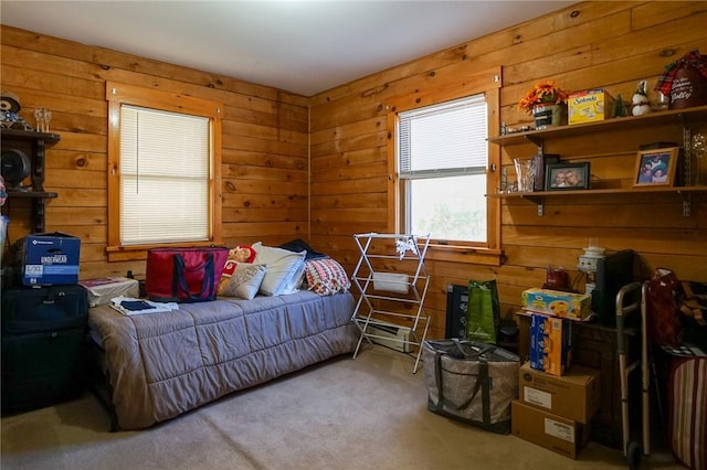 bedroom with carpet flooring and wood walls