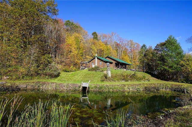 surrounding community featuring a water view