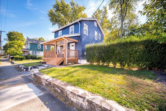 view of front of property with a front lawn