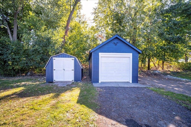 garage featuring a yard