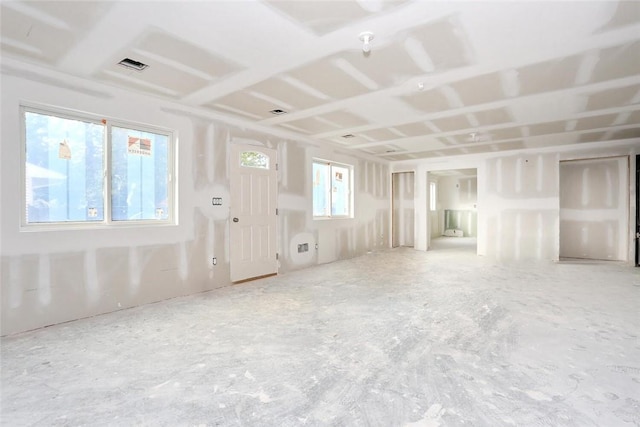 spare room featuring plenty of natural light