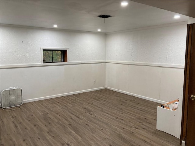 spare room with dark hardwood / wood-style flooring