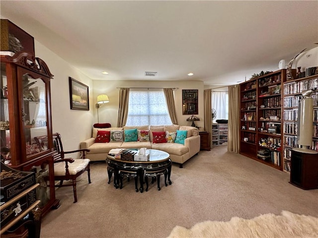 living room featuring light colored carpet