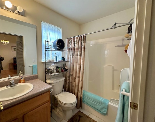 full bathroom featuring tile patterned flooring, vanity, toilet, and shower / tub combo with curtain