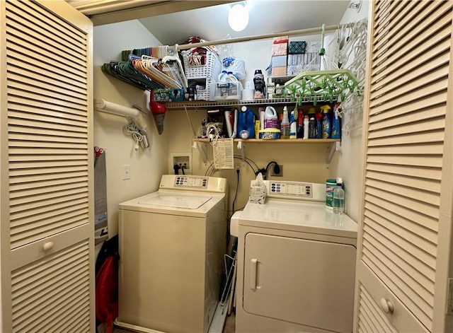 laundry room with independent washer and dryer