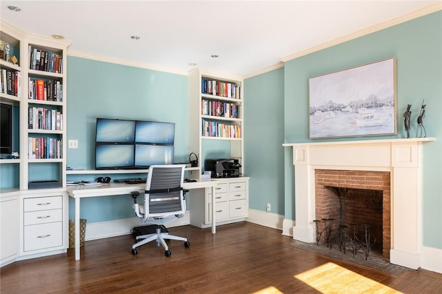 home office featuring dark hardwood / wood-style floors, a brick fireplace, and crown molding