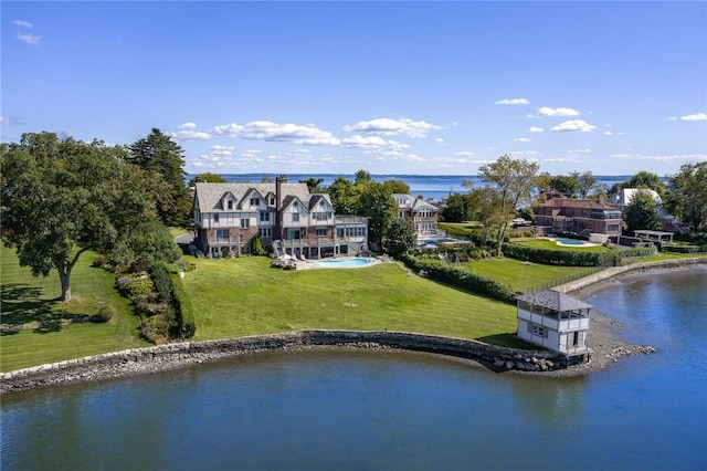 bird's eye view with a water view