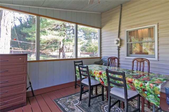 sunroom / solarium featuring wood ceiling