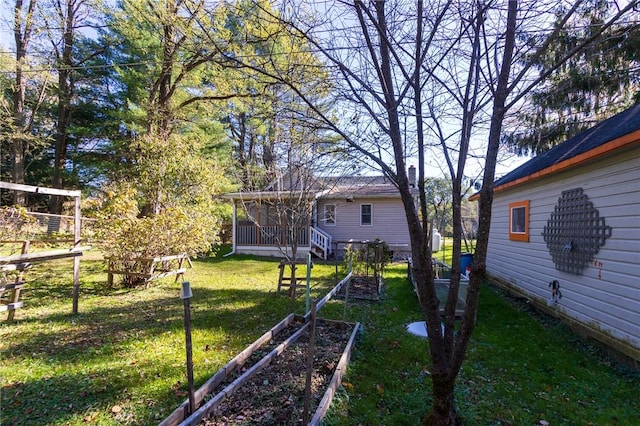 view of yard featuring a sunroom