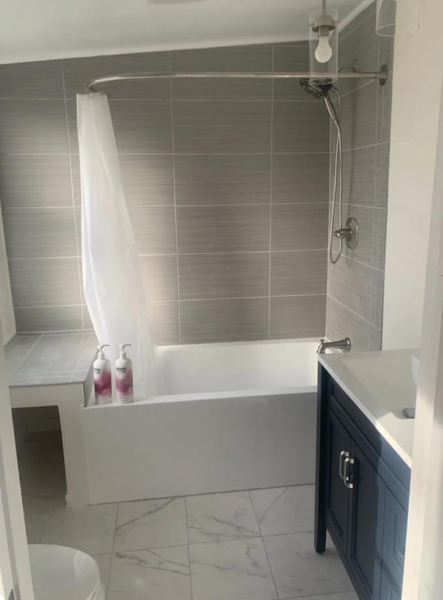 full bathroom with toilet, vanity, and shower / bathtub combination with curtain