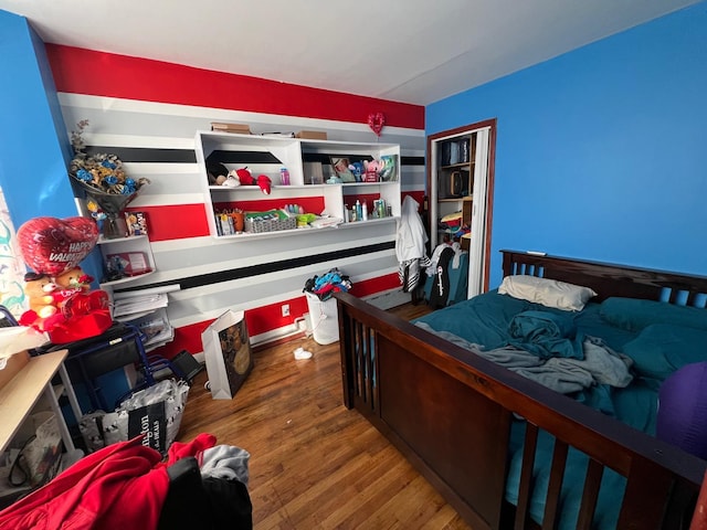 bedroom featuring wood-type flooring