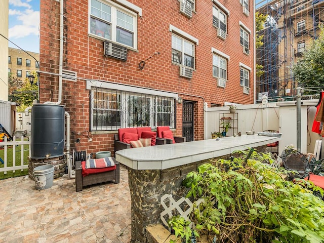 rear view of house with a patio