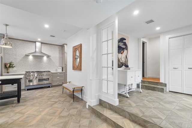 corridor featuring light parquet floors