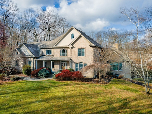 view of front of home with a front yard