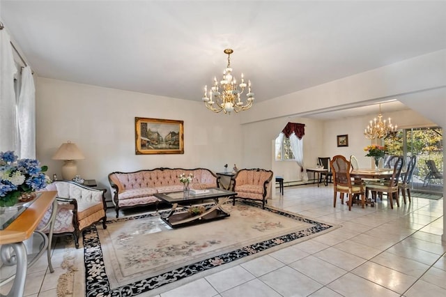 living room featuring a notable chandelier and light tile patterned floors