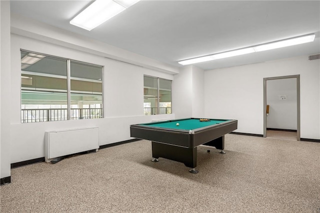 game room featuring a healthy amount of sunlight, radiator heating unit, and pool table