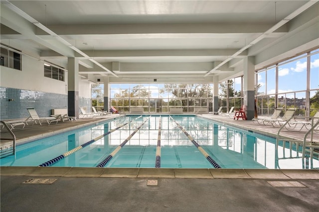 view of pool featuring a patio