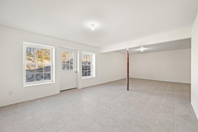 basement with light tile patterned floors