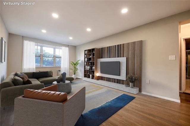 living room with hardwood / wood-style floors