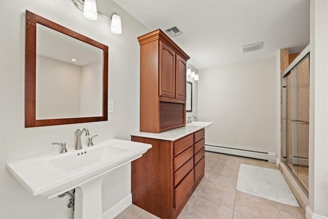 bathroom featuring walk in shower, tile patterned floors, and baseboard heating