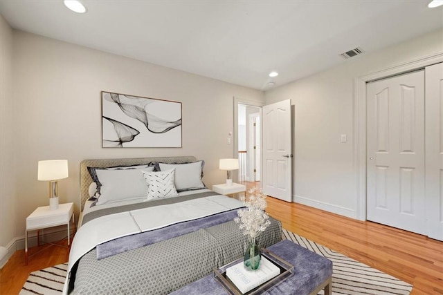 bedroom featuring a closet and hardwood / wood-style floors