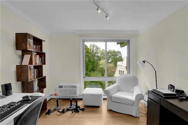 living area featuring an AC wall unit, rail lighting, ornamental molding, a baseboard radiator, and light hardwood / wood-style floors