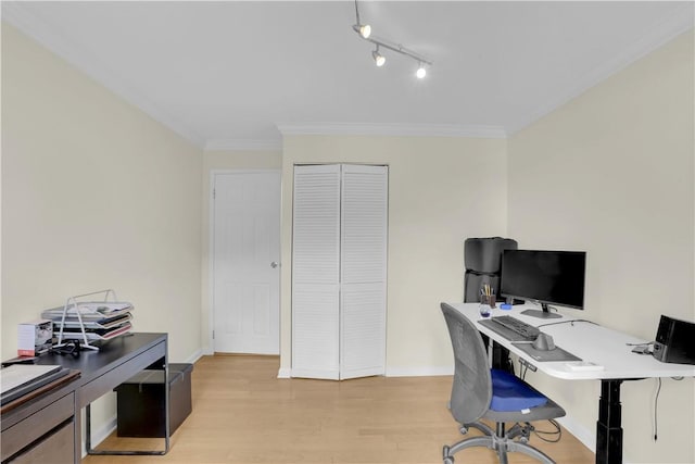 office area featuring crown molding and light hardwood / wood-style flooring