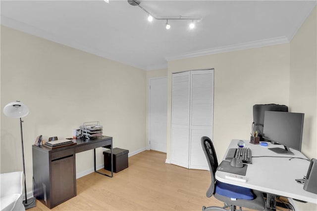 office area featuring light hardwood / wood-style flooring and ornamental molding