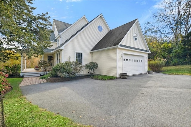 view of property exterior featuring a garage