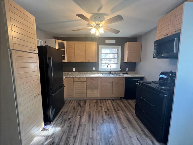 kitchen featuring black appliances, sink, hardwood / wood-style flooring, ceiling fan, and light brown cabinetry