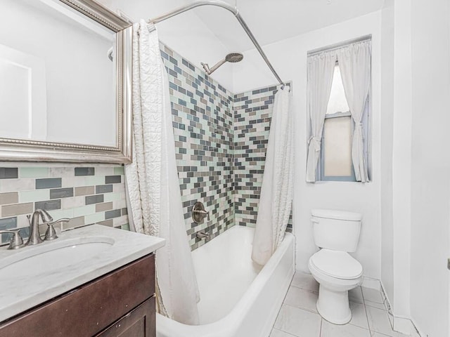 full bathroom with decorative backsplash, shower / tub combo, vanity, tile patterned flooring, and toilet