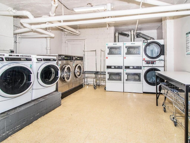 laundry area with washer and dryer and stacked washer / dryer