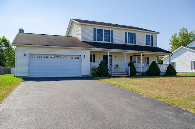126 Canterbury, Saugerties, NY 12477 - view of front of house featuring driveway, an attached garage, and covered porch