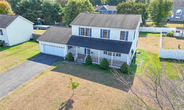 126 Canterbury, Saugerties, NY 12477 - view of front facade with covered porch, a shingled roof, an attached garage, and asphalt driveway