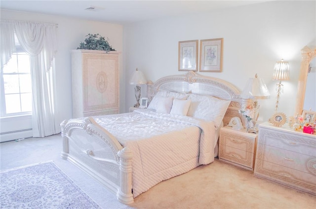 bedroom featuring light colored carpet