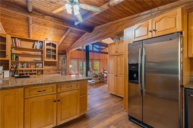 kitchen with light stone countertops, stainless steel refrigerator with ice dispenser, dark wood-type flooring, wooden ceiling, and vaulted ceiling with beams