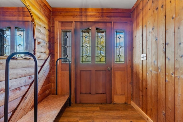356 Nimham Rd, Carmel, NY 10512 - entrance foyer with wood finished floors, wooden walls, and rustic walls