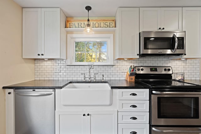 kitchen with white cabinets, sink, and stainless steel appliances