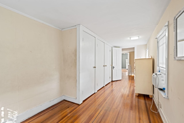 hall featuring hardwood / wood-style flooring and cooling unit