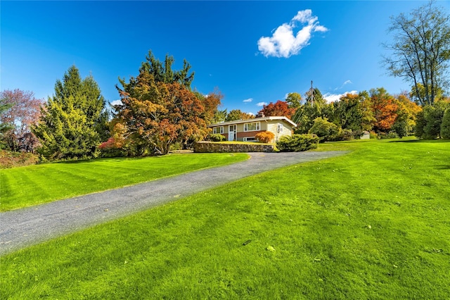 exterior space featuring a lawn