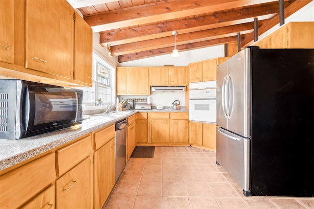 kitchen with lofted ceiling with beams, sink, appliances with stainless steel finishes, light tile patterned flooring, and wood ceiling