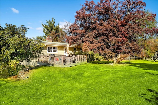 view of yard featuring a deck