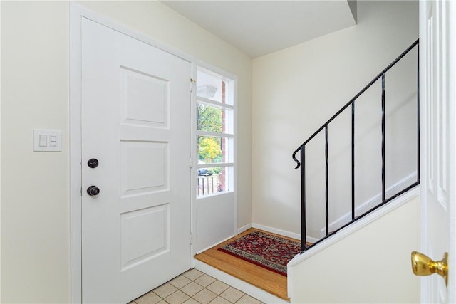 foyer entrance with light hardwood / wood-style flooring