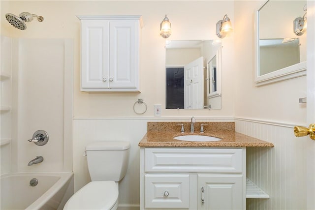 full bathroom featuring vanity, shower / bath combination, and toilet