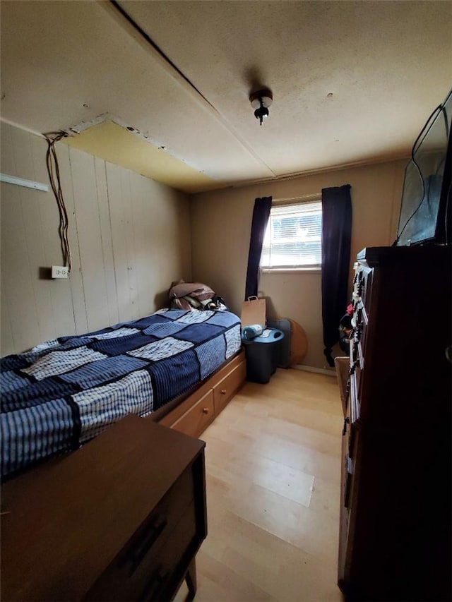 bedroom featuring light hardwood / wood-style floors